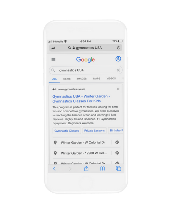 Phone showing a Google search for gymnastics near me